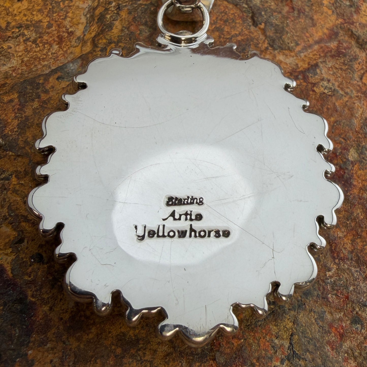 Kingman Turquoise Oval Pendant by Artie Yellowhorse - reverse showing Artie Yellowhorse hallmark stamp