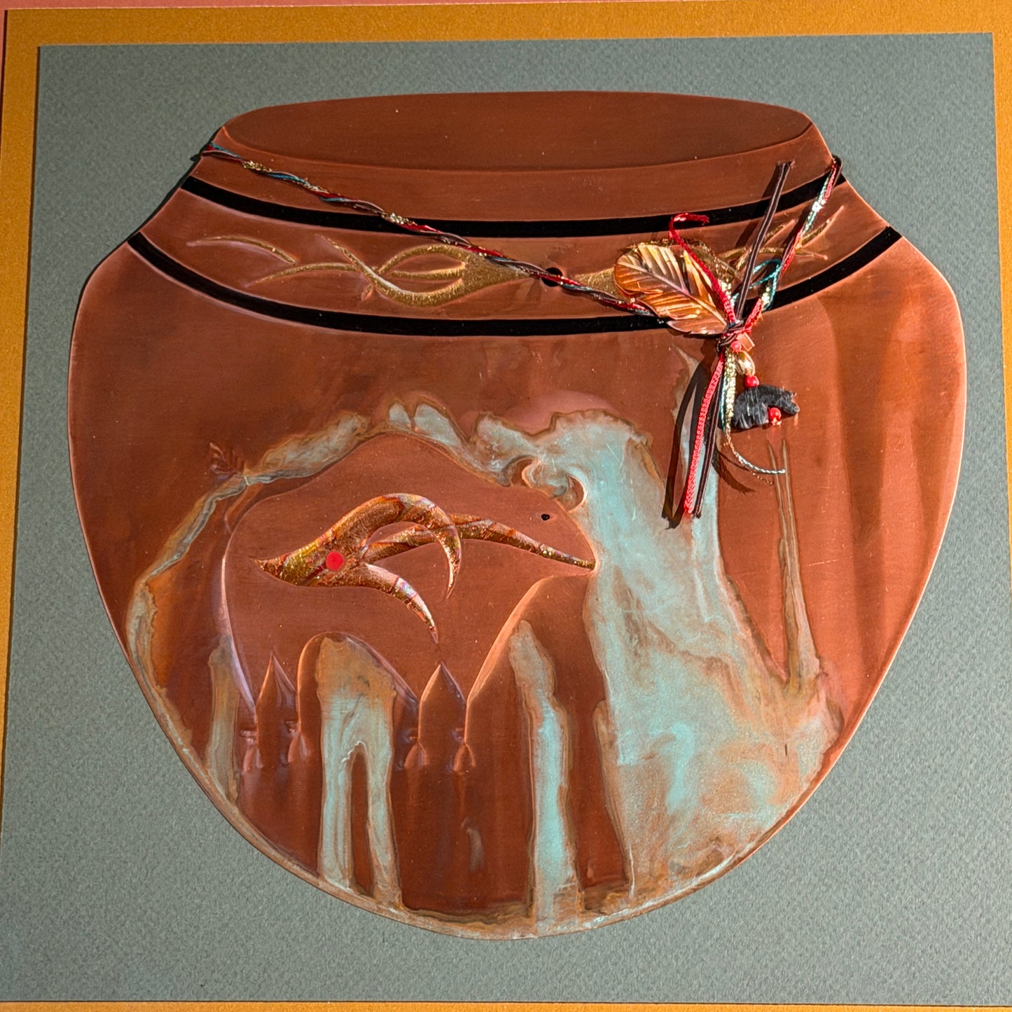 Decorative ceramic bowl with artistic depiction of a deer and floral elements on a gray background.