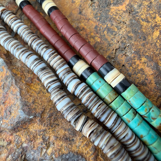 Various different color beads on a necklace
