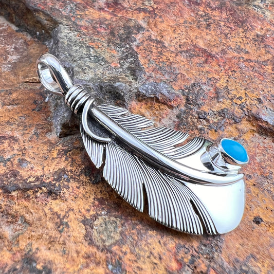 Sterling Silver Feather Pendant with Sleeping Beauty Turquoise by Ray Coriz