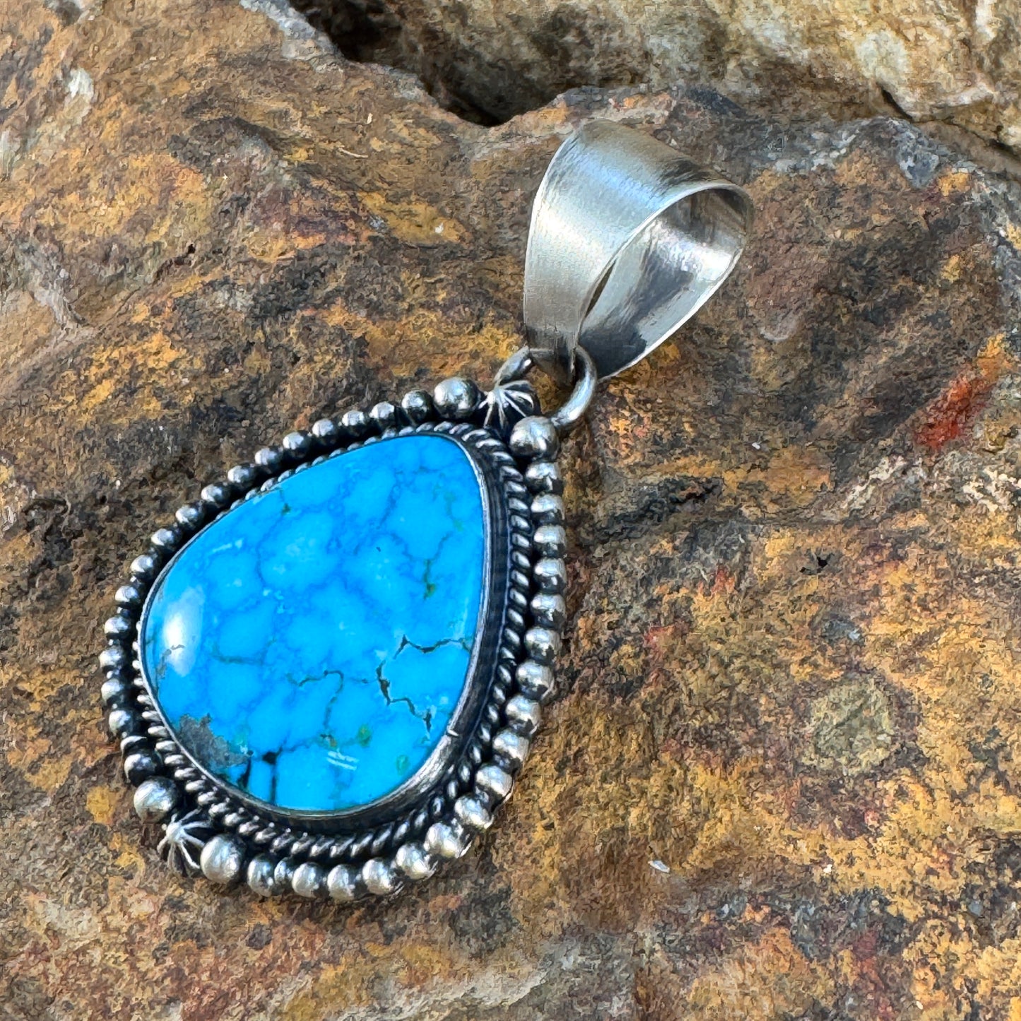 Kingman Turquoise Sterling Silver Pendant by Loretta Delgarito