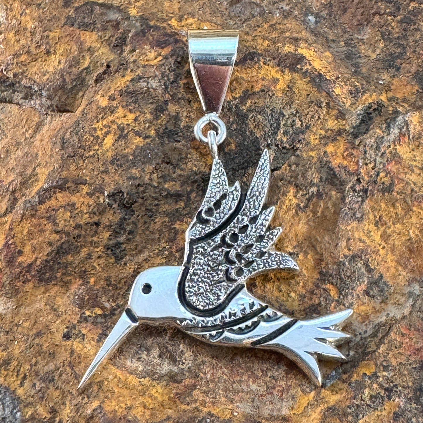 Sterling Silver Pendants by Norman Woody