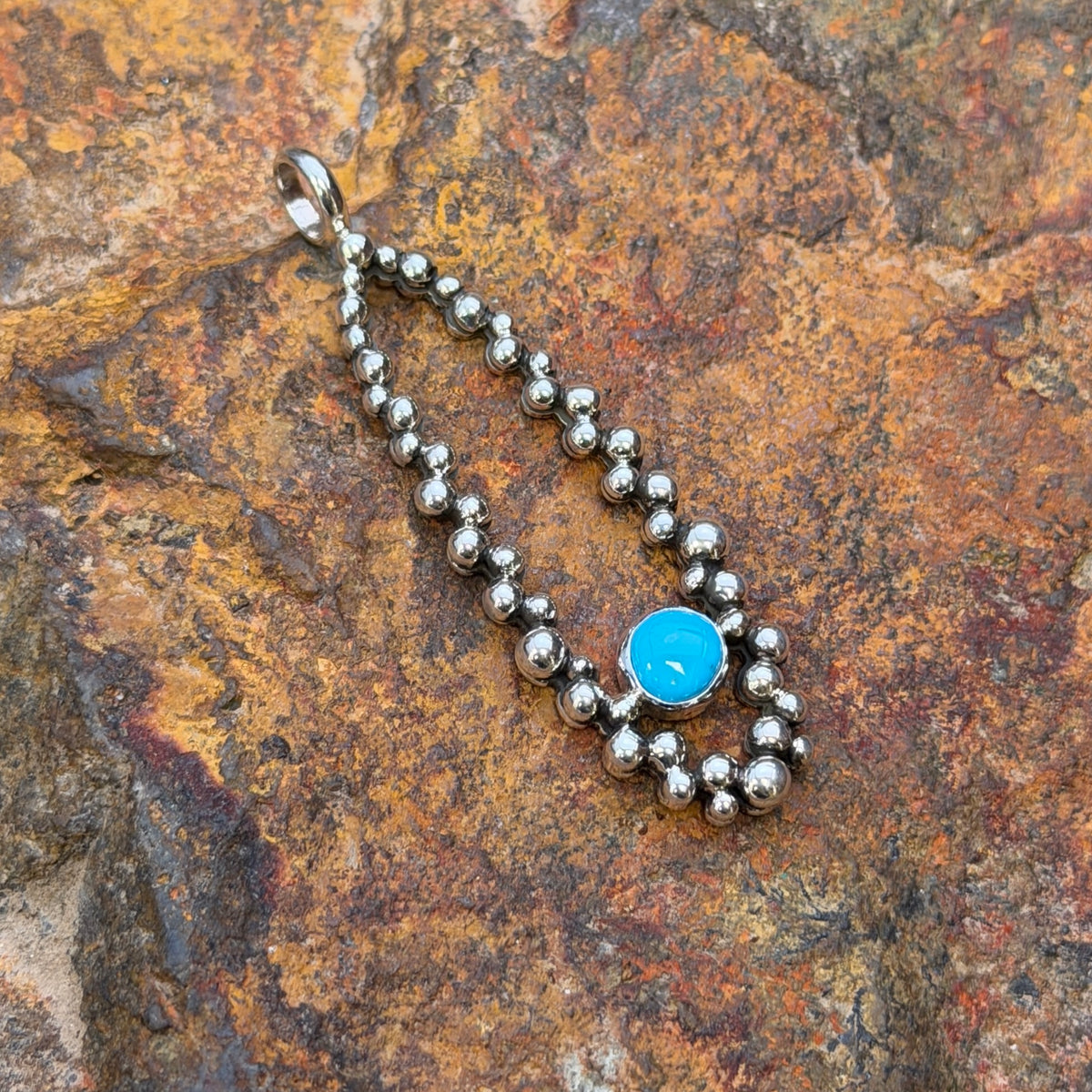 Million Drops Sleeping Beauty Turquoise Sterling Silver Pendant by Ray Coriz
