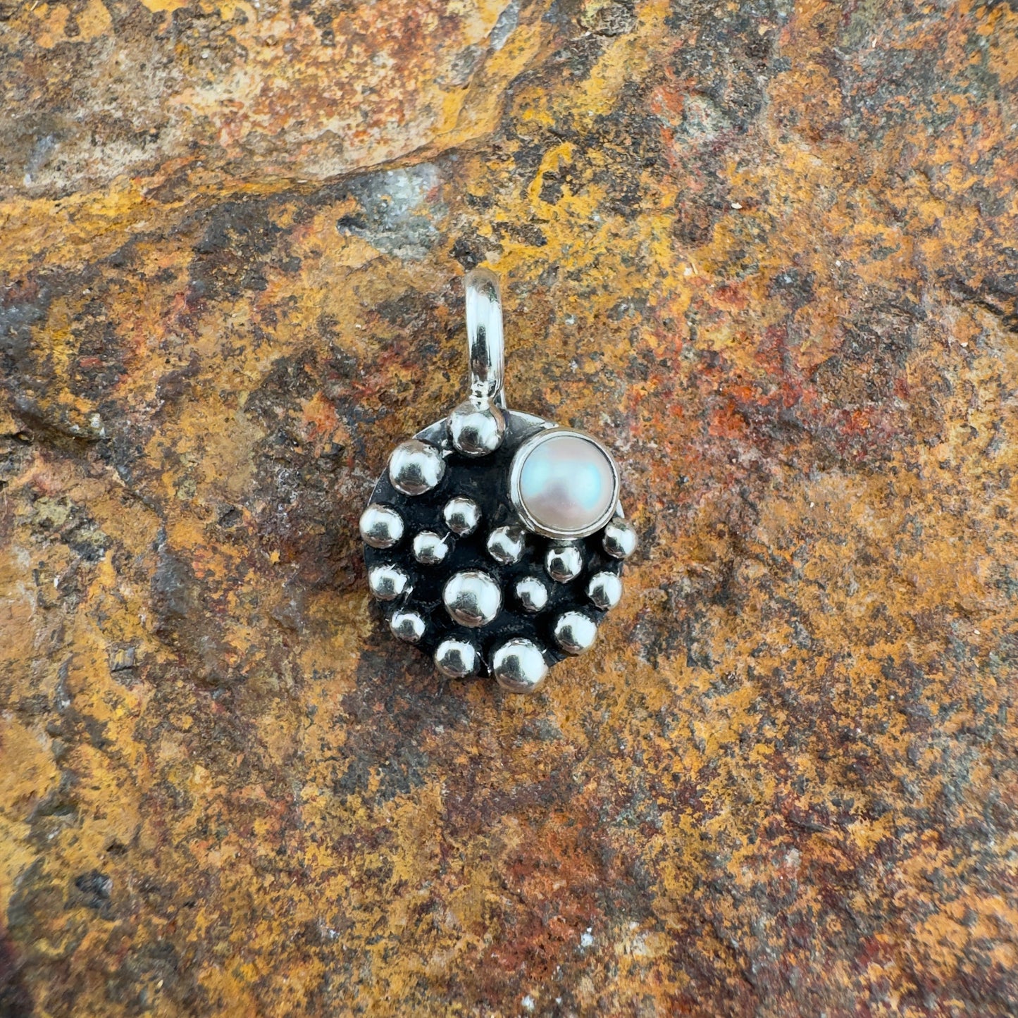 Million Drops Sterling Silver Round Pendant by Ray Coriz