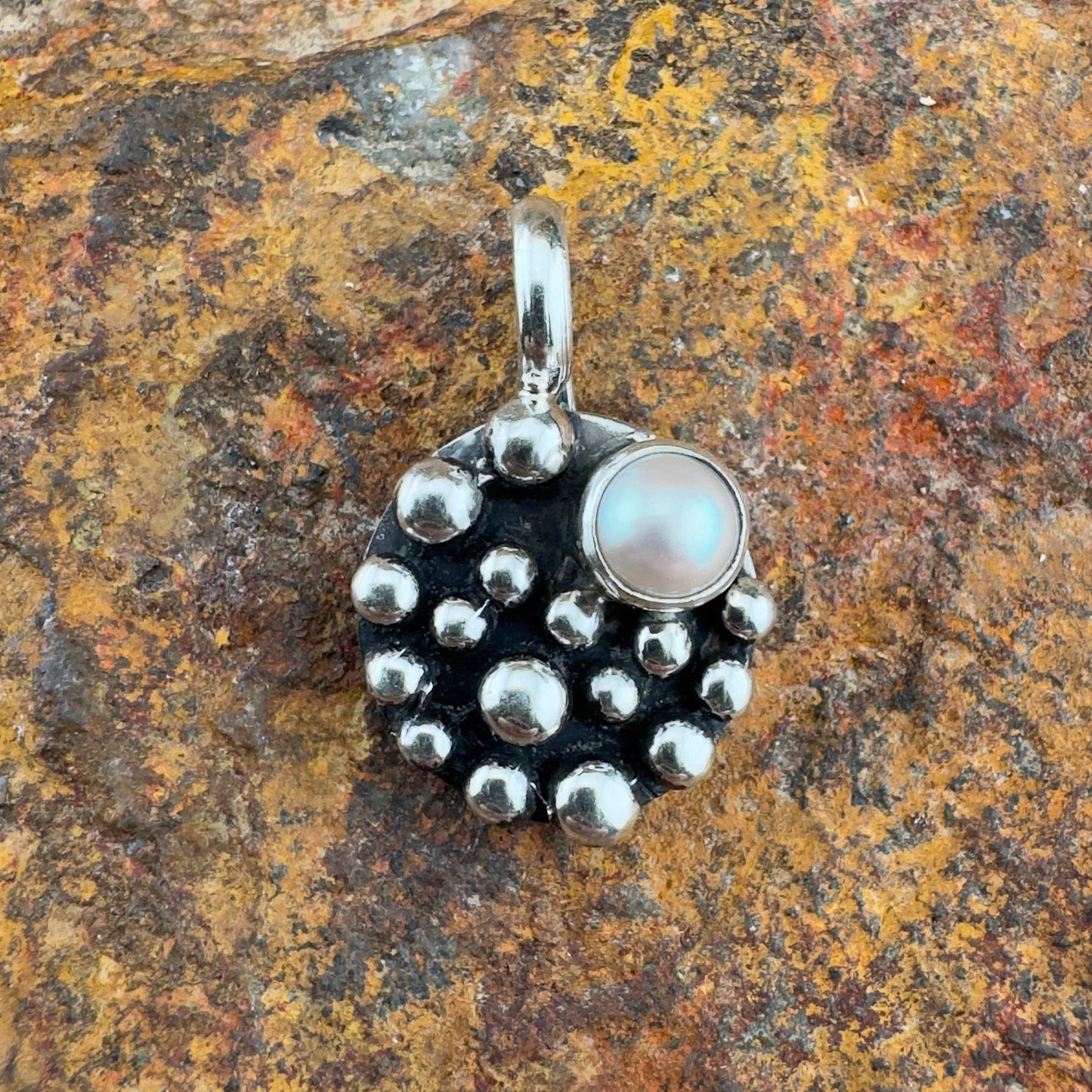 Million Drops Sterling Silver Round Pendant by Ray Coriz