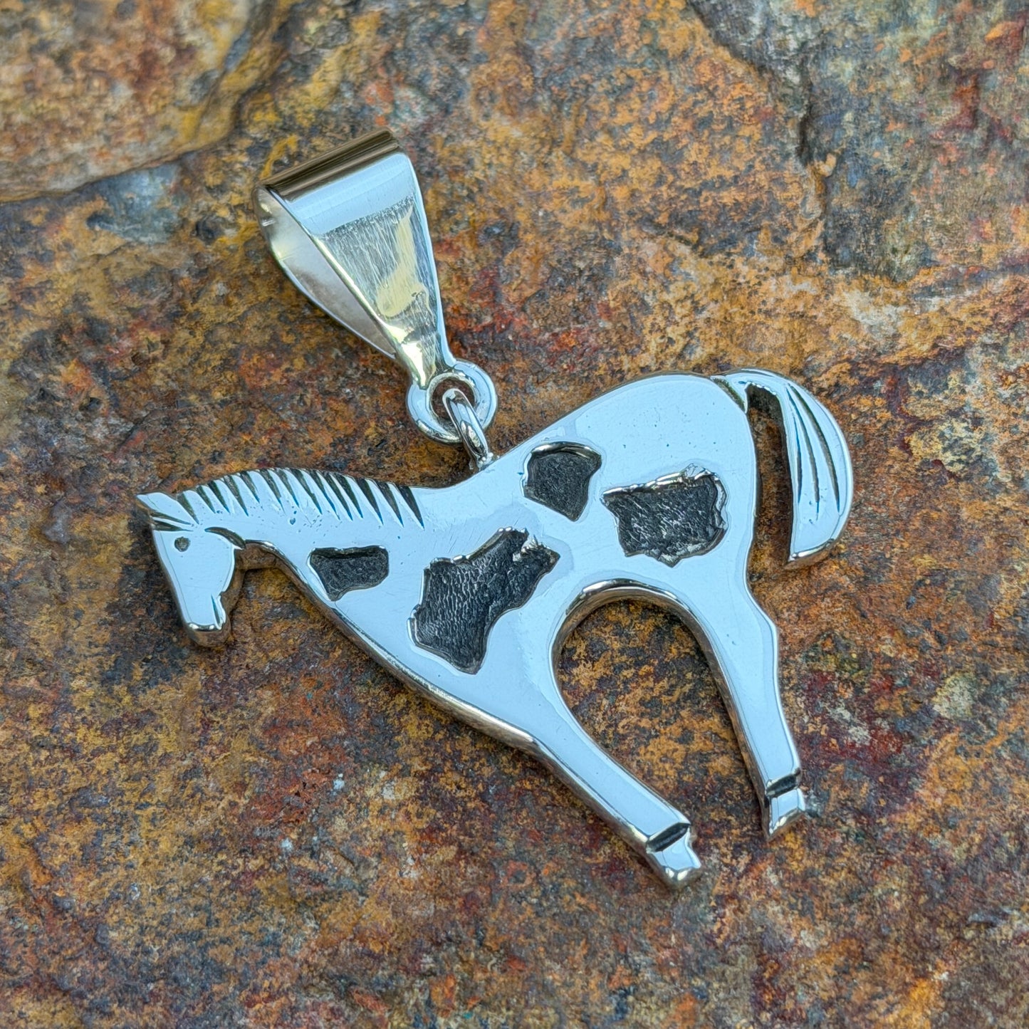 Sterling Silver Pendants by Norman Woody