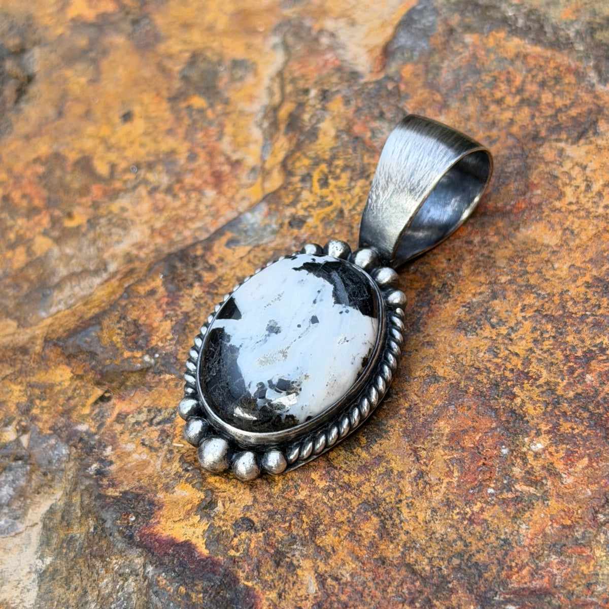 Sterling Silver Oval White Buffalo Pendant by Angela Martin