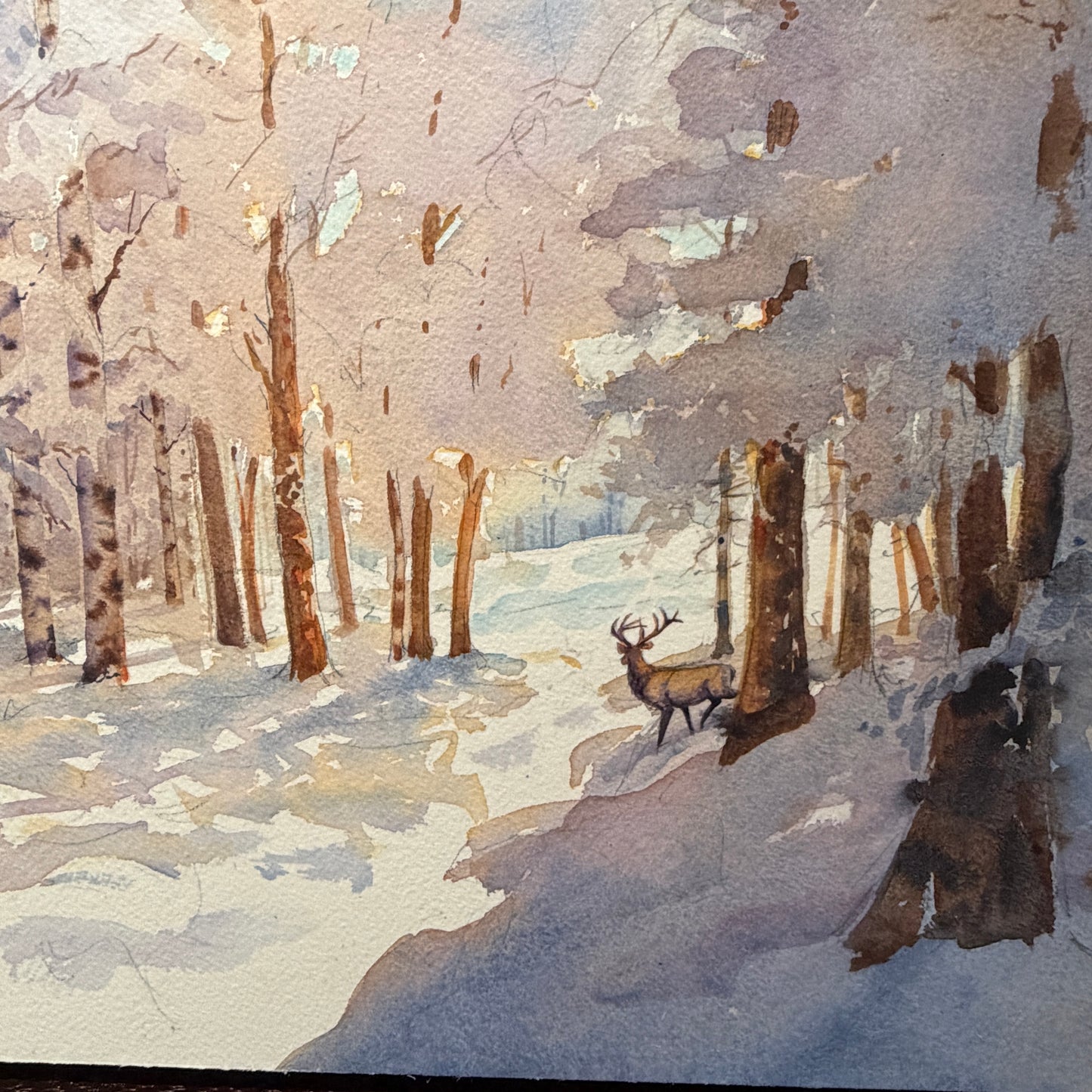 Winter forest scene with a deer, painted in watercolor.
