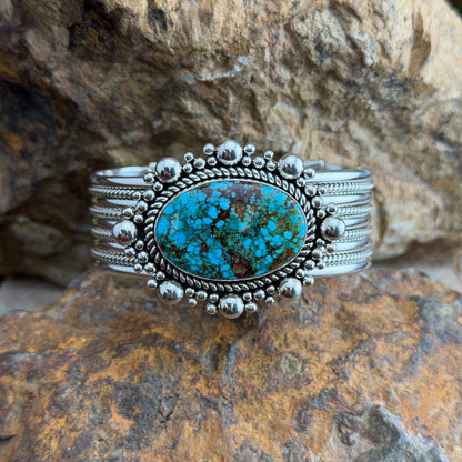 Kingman Turquoise Cuff Bracelet by Artie Yellowhorse - front view showing stone face and graduated silver bead surround
