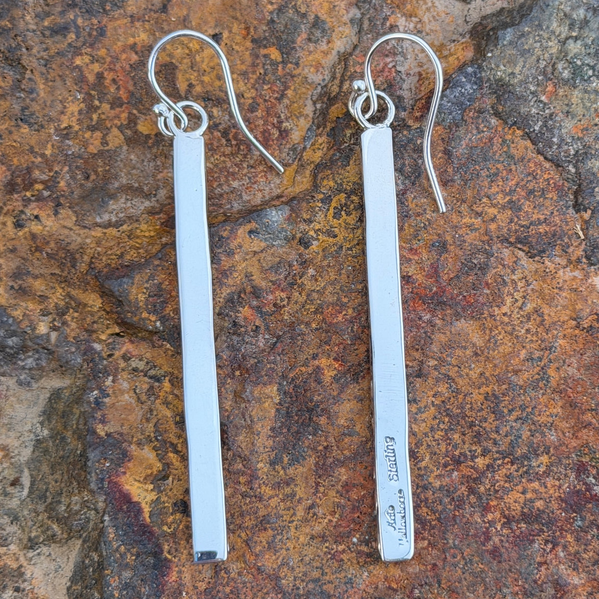 Contemporary thin rectangle earrings with rectangle designs by artie yellowhorse 