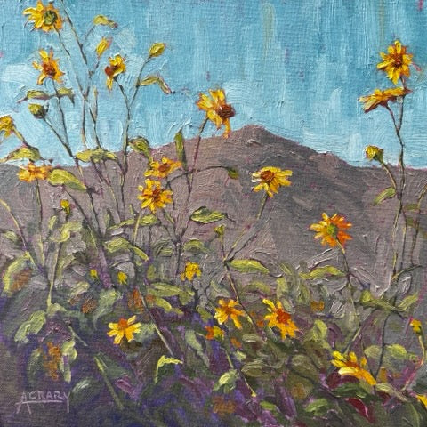 An impressionistic oil painting of yellow wildflowers with green and purple foliage in front of a gray mountain under a textured light blue sky. The artist's signature 'AECARI' is visible in the bottom-left corner.