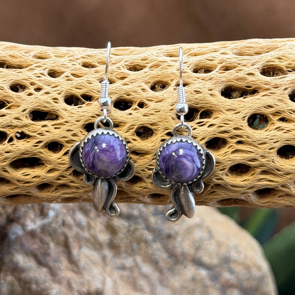 purple charoite cabochons with serrated bezel and silverwork dangle earrings by mary tso