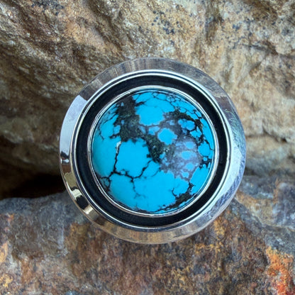 Chinese Turquoise Ring by Artie Yellowhorse - angled view of vivid blue turquoise in sterling silver setting