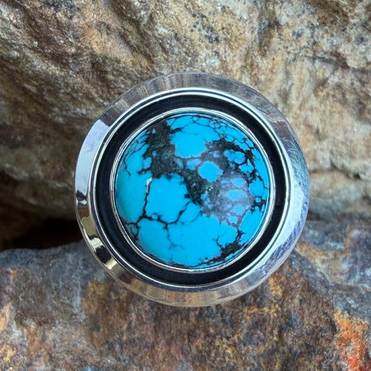 Chinese Turquoise Ring by Artie Yellowhorse - angled view of vivid blue turquoise in sterling silver setting