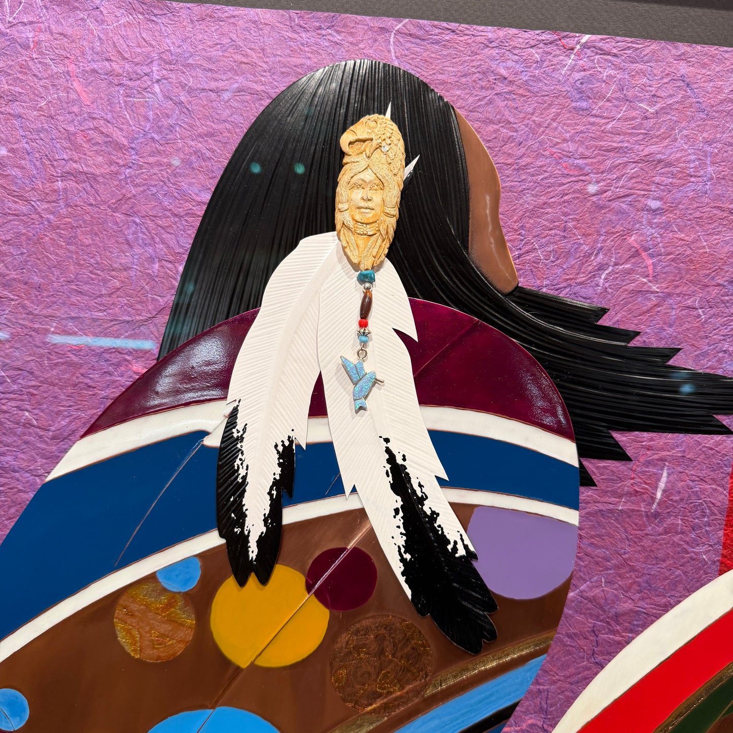 Colorful abstract art piece with a figure wearing a headdress against a textured purple background