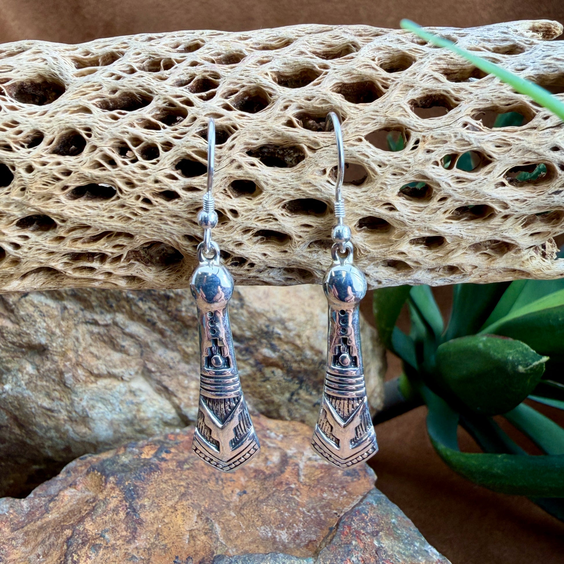 Silver earrings with intricate stamped design
