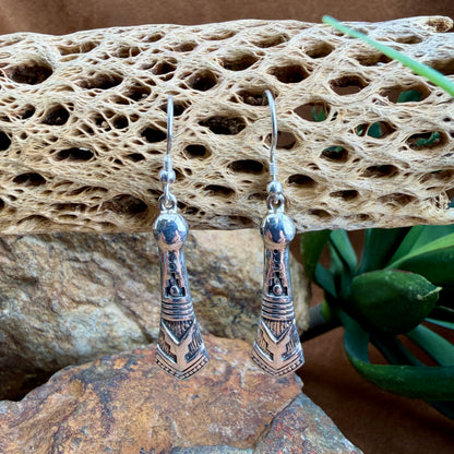 Silver earrings with intricate stamped design