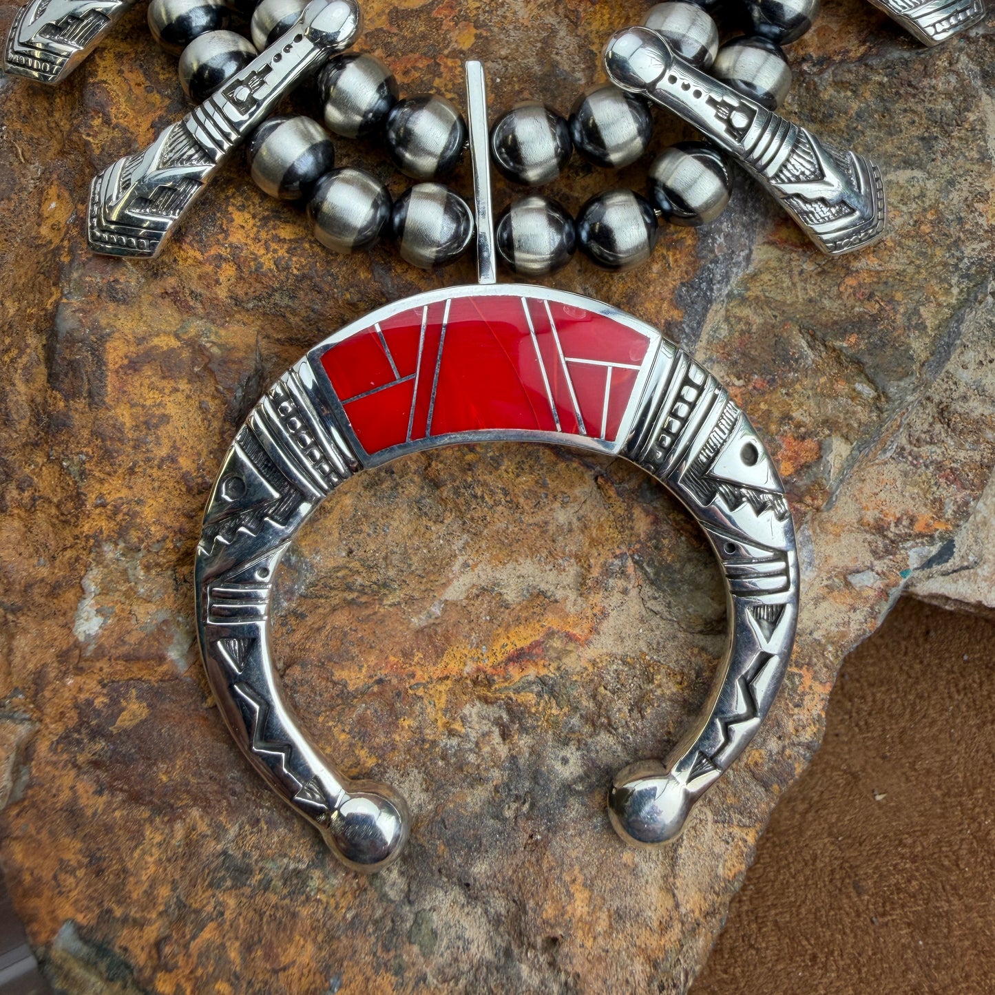 Silver and red pendant 