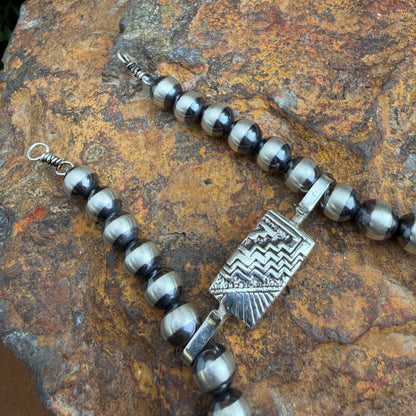 Silver clasp with intricate design