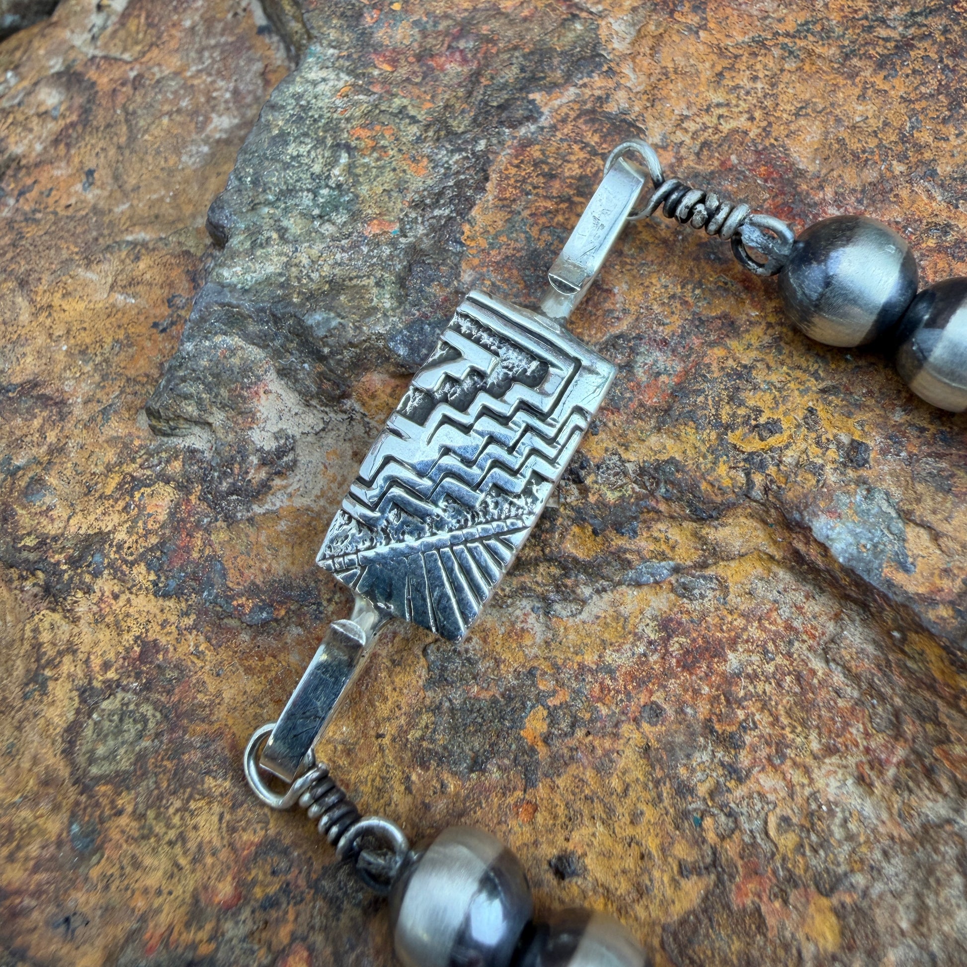 Silver clasp with intricate design