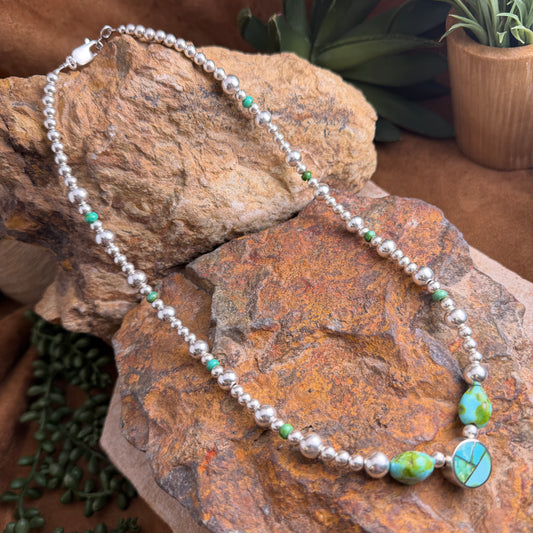 Sterling silver Necklace with turquoise nuggets and inlaid turqouise centerpiece