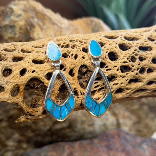 Pair of Sterling Silver Drop Post earrings That feature light blue stone inlay