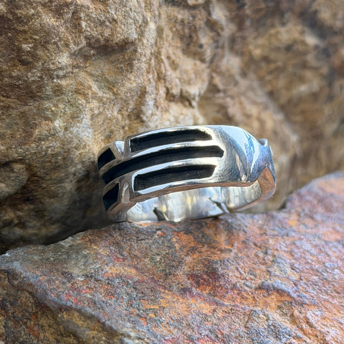 A silver-toned metal ring 