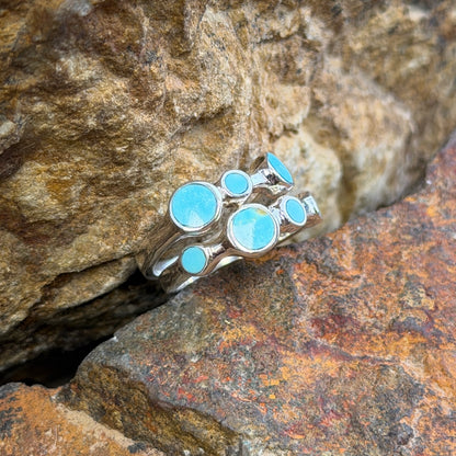 Side view of David Rosales two-piece Arizona Blue Kingman turquoise sterling silver ring set