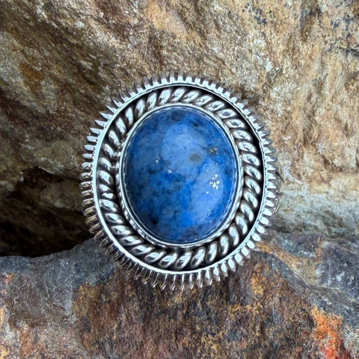 Denim Lapis Ring by Artie Yellowhorse - top view showing oval blue cabochon and rope silverwork