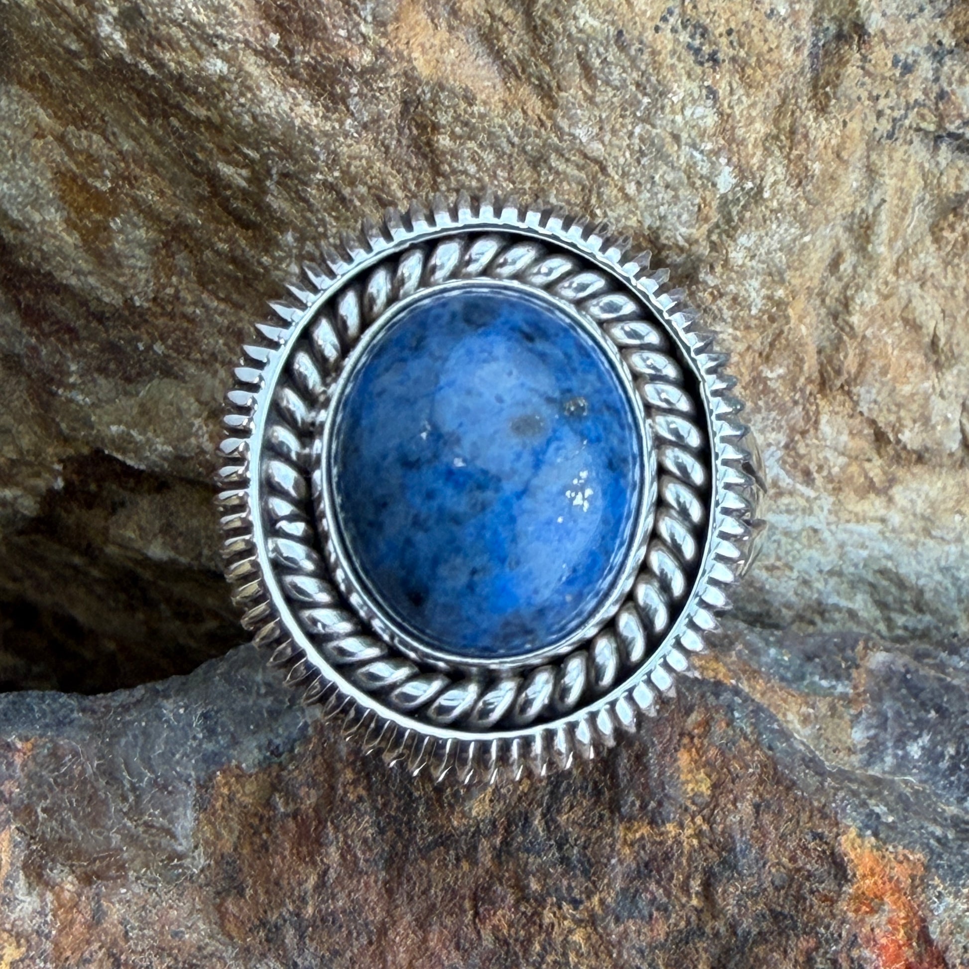 Denim Lapis Ring by Artie Yellowhorse - top view showing oval blue cabochon and rope silverwork