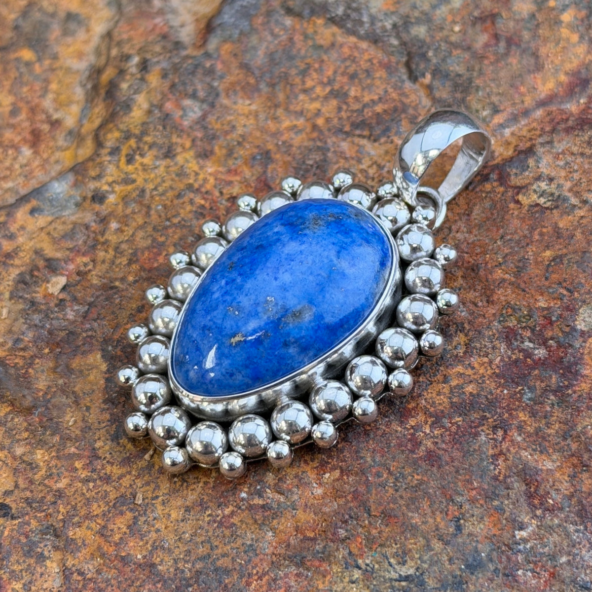 Denim Lapis Oval Sterling Silver Pendant by Artie Yellowhorse