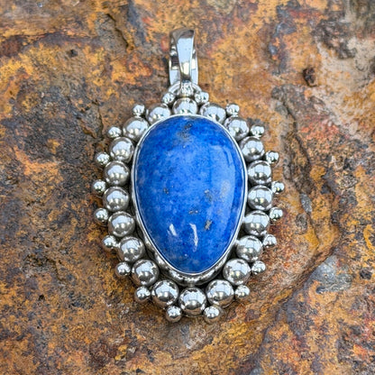 Denim Lapis Oval Sterling Silver Pendant by Artie Yellowhorse