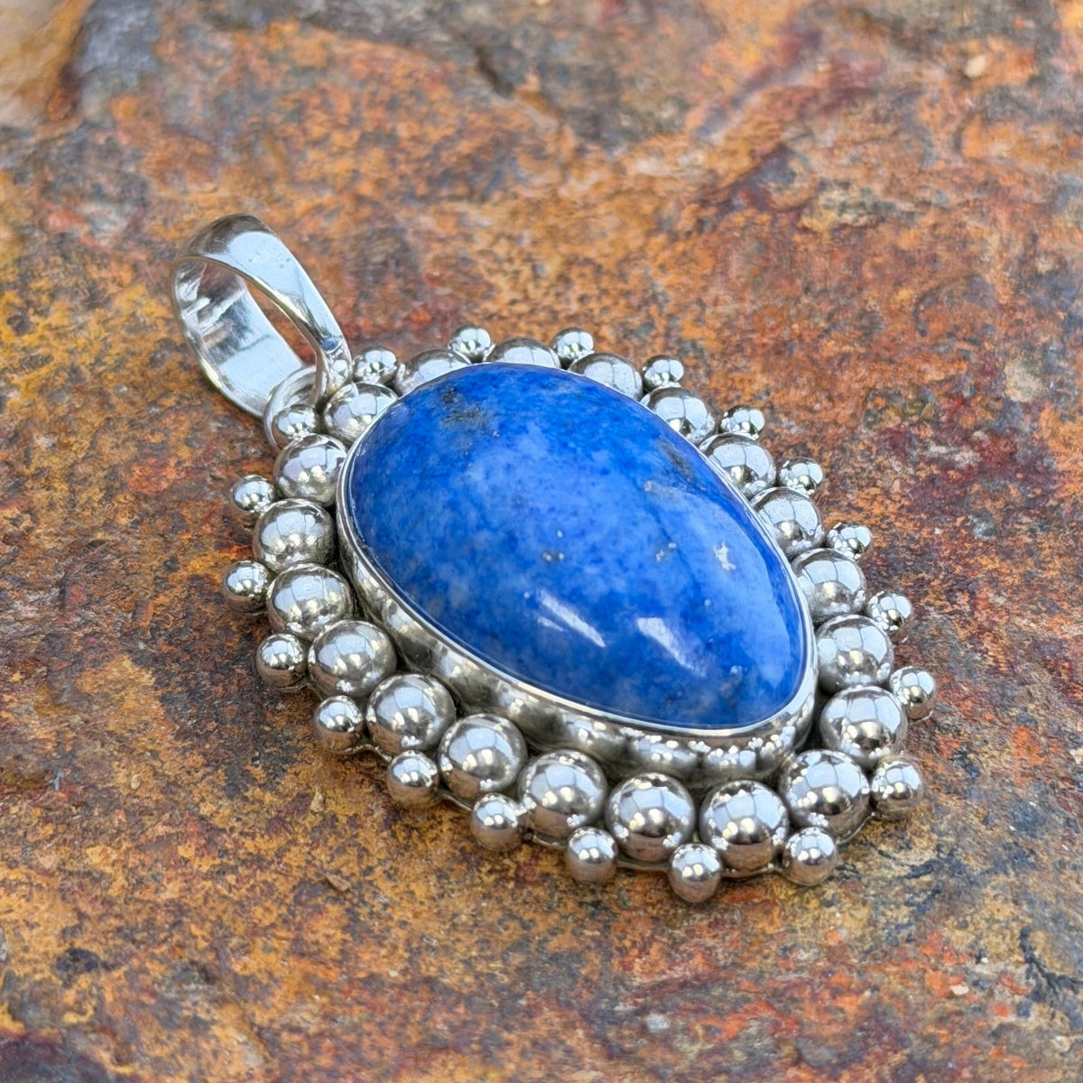 Denim Lapis Oval Sterling Silver Pendant by Artie Yellowhorse