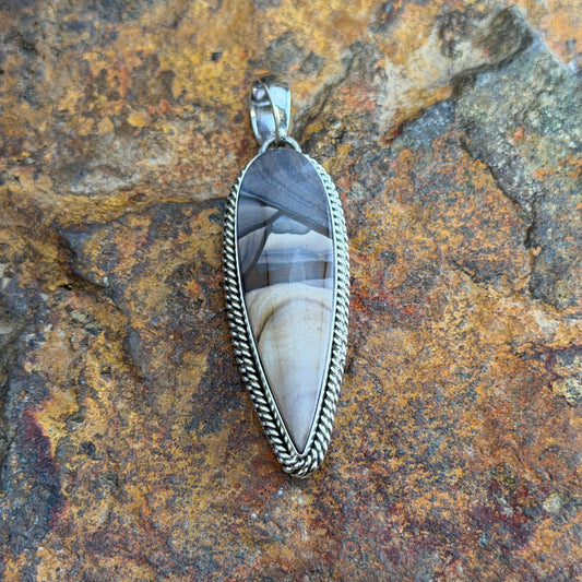 Deschutes Jasper Pendant by Artie Yellowhorse - front view showing full lance-shaped cabochon with cream and charcoal banding