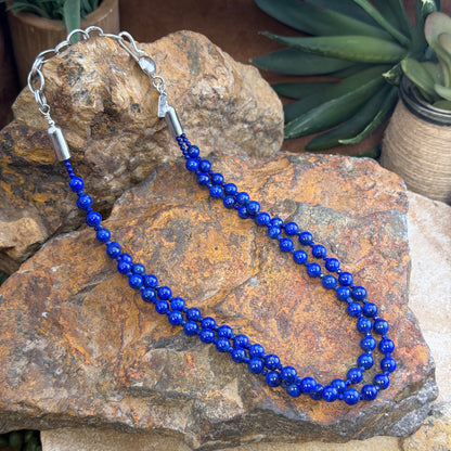 Sterling clasp and Desiree Yellowhorse Sterling hallmark on a double-strand lapis necklace