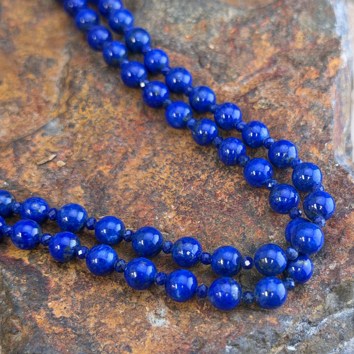 Detail of sterling silver clasp and links on the double-strand lapis necklace