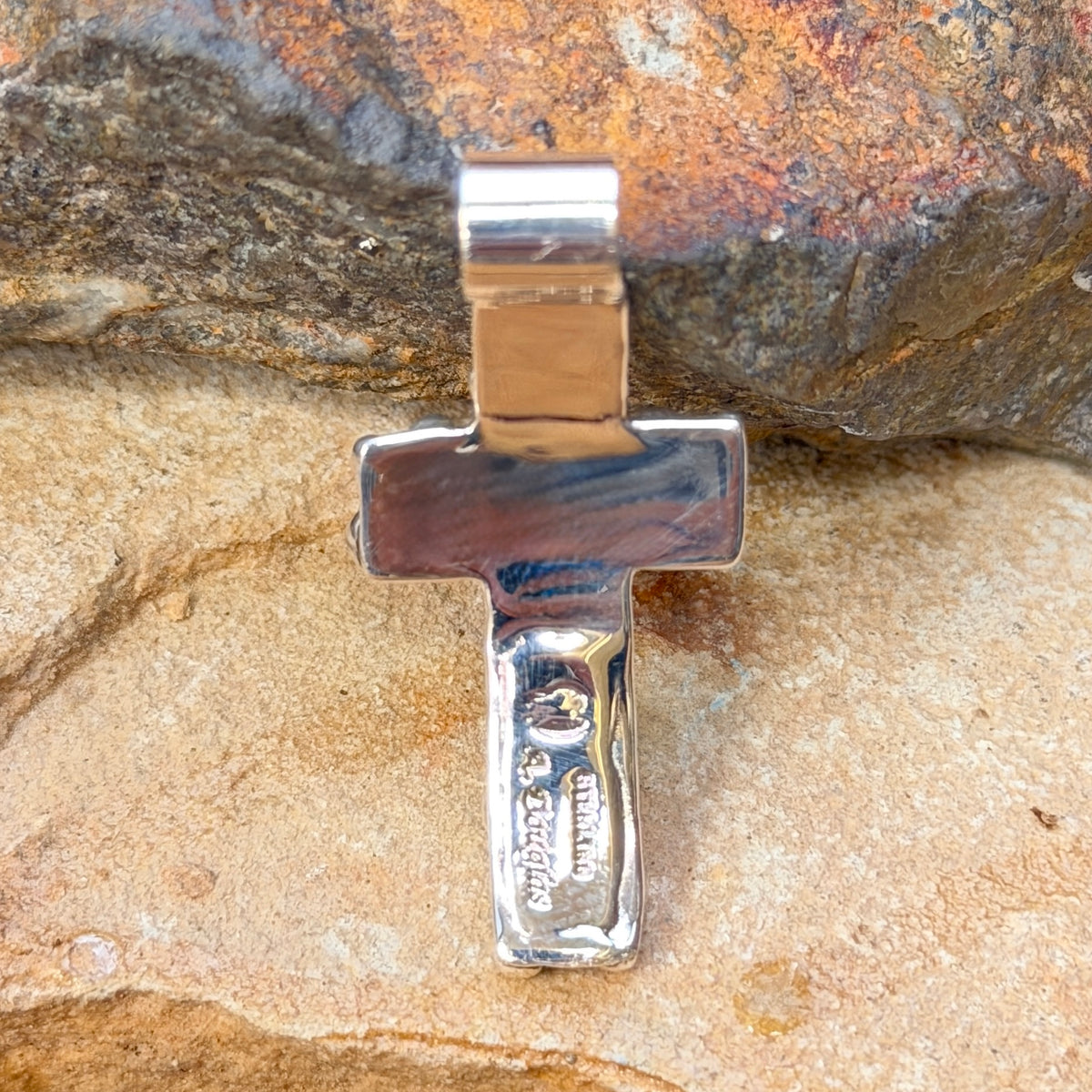 Oval freshwater pearl and silver drops on Akee Douglas cross pendant