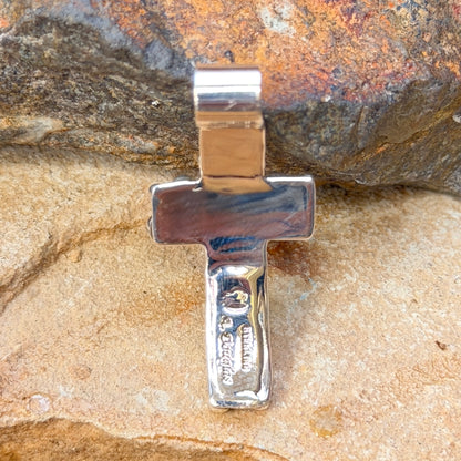 Oval freshwater pearl and silver drops on Akee Douglas cross pendant