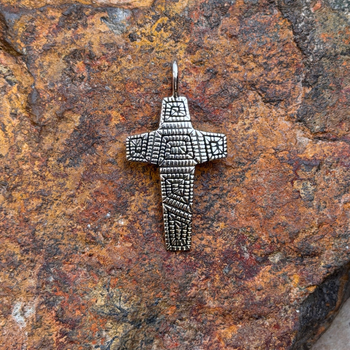 Sterling silver geometric cross pendant by Elgin Tom, front view