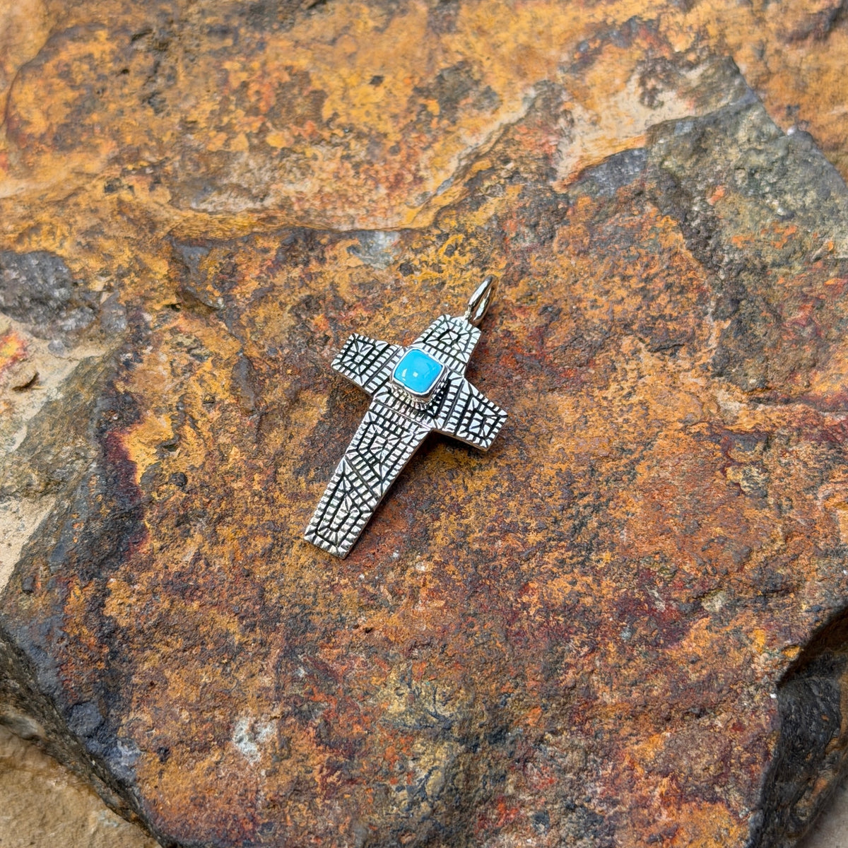 Elgin Tom Sleeping Beauty turquoise geometric cross pendant, front view