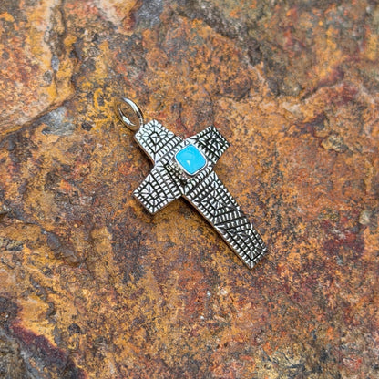 Geometric silver detailing and blue turquoise on Elgin Tom cross pendant