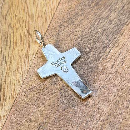 back of elgin tom sterling silver cross pendant showcasing stamping