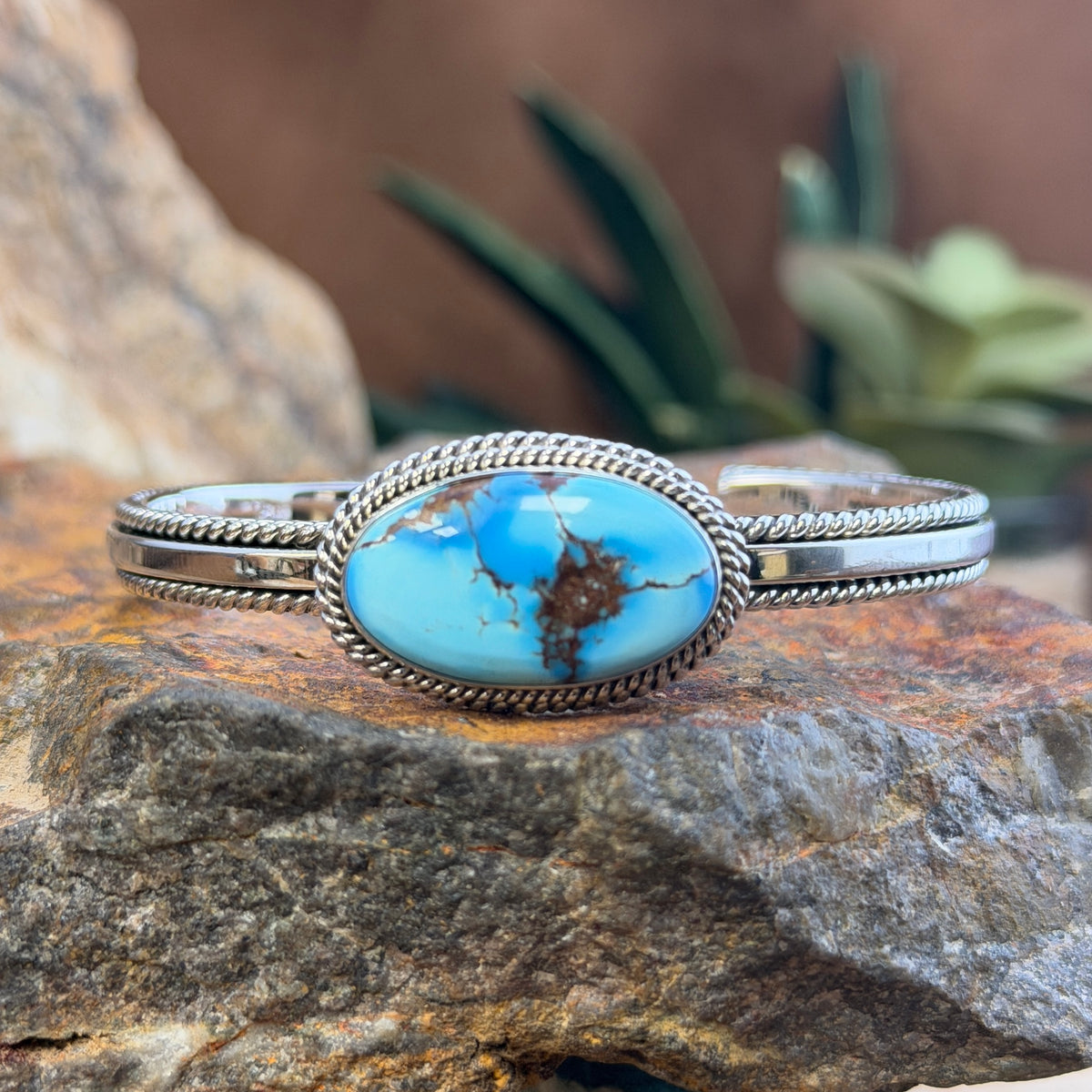 Inside of sterling silver cuff showing the Artie Yellowhorse hallmark
