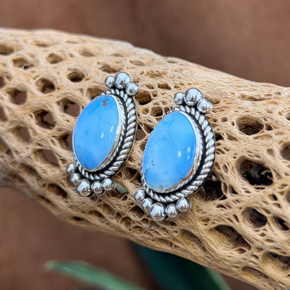 Pair of Artie Yellowhorse Golden Hill turquoise post earrings, front view
