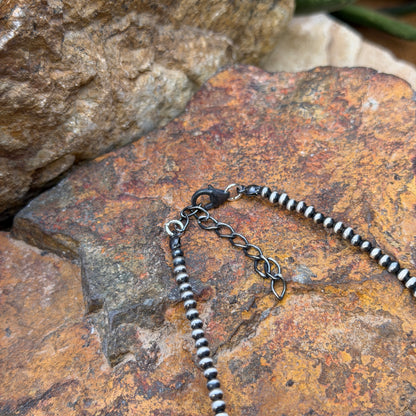 Full view of 18-inch graduated Navajo pearl necklace with extender