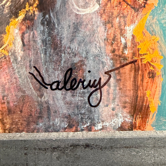 Signature on a piece of abstract art with colorful brush strokes
