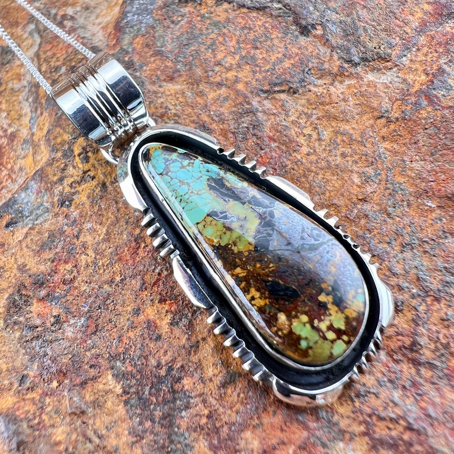 Blackjack Turquoise Pendant by Wil Denetdale
