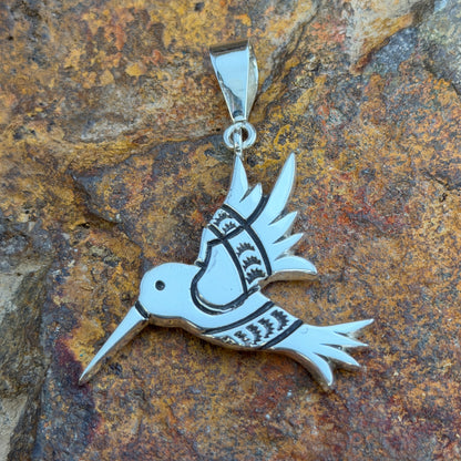 Sterling Silver Pendants by Norman Woody
