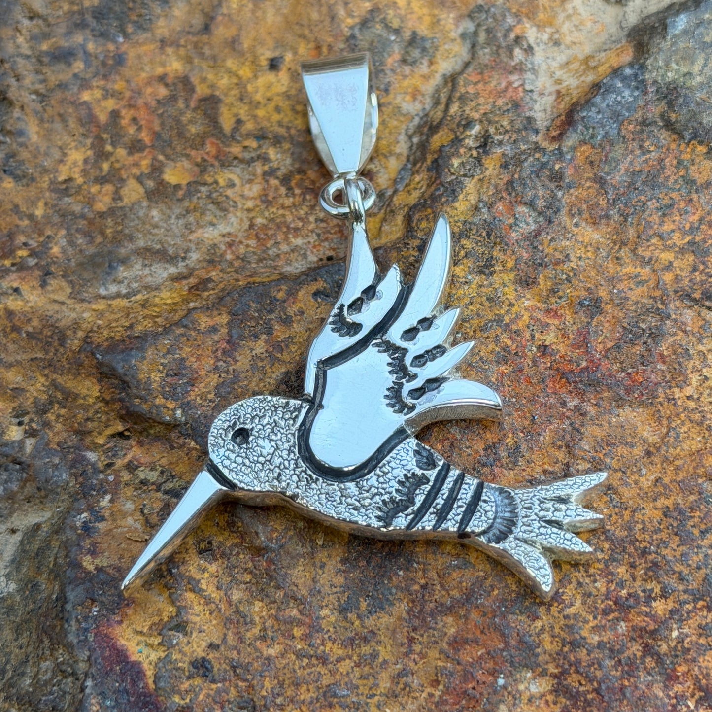 Sterling Silver Pendants by Norman Woody