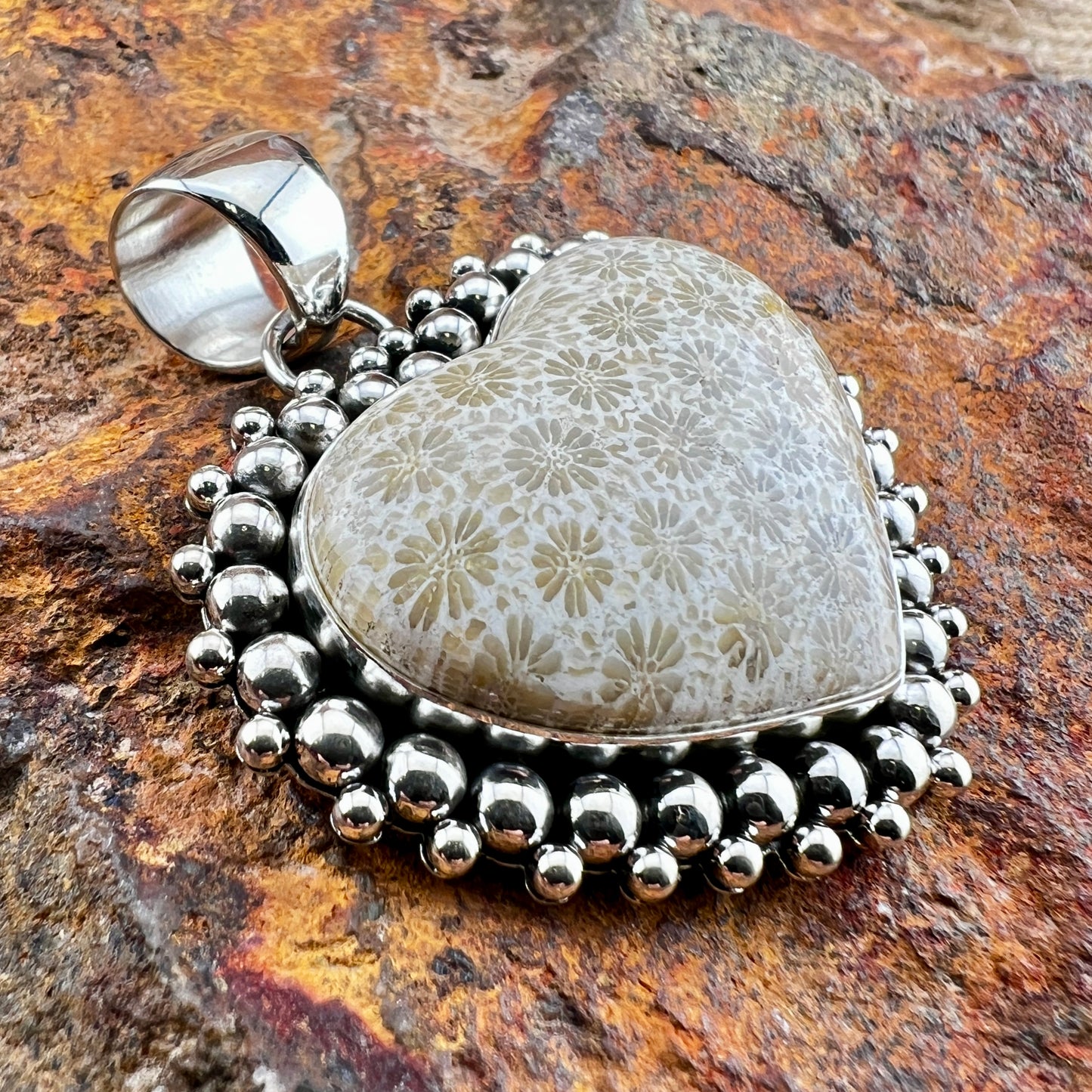 Fossil Coral Heart Pendant by Artie Yellowhorse